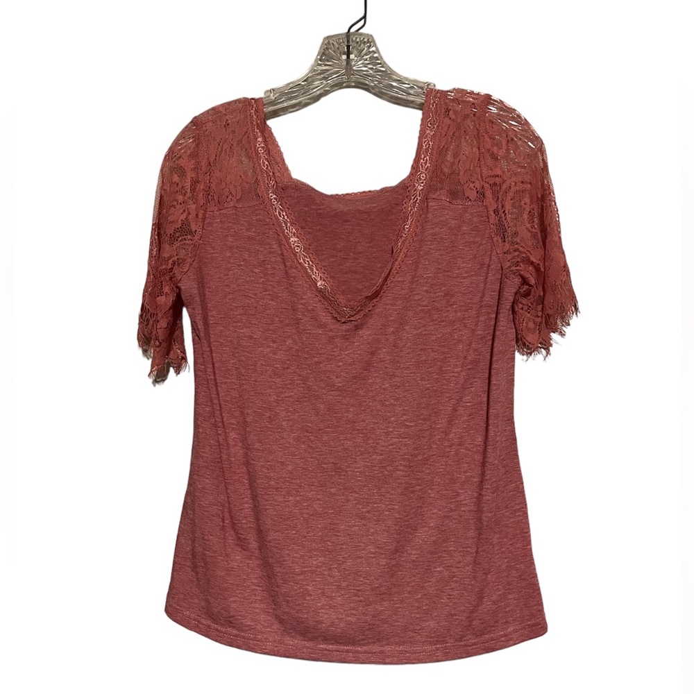 Boutique shirt, very pretty pink/mauve color. Size medium.